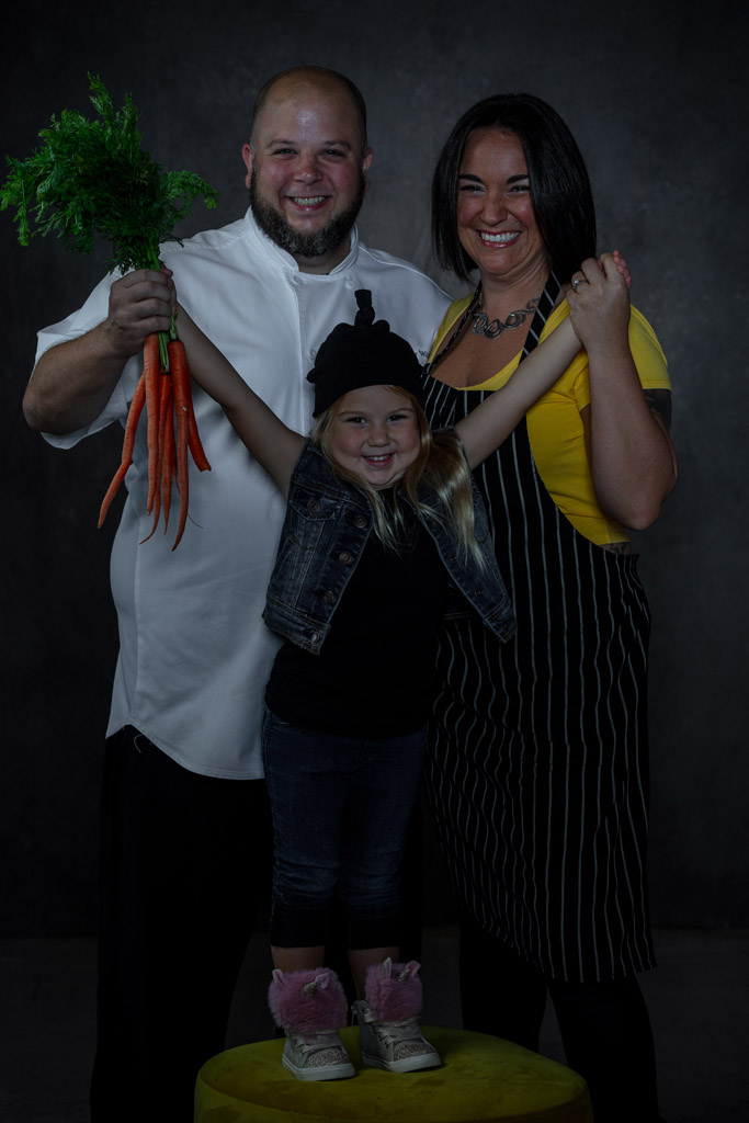 Happy chef portrait of family