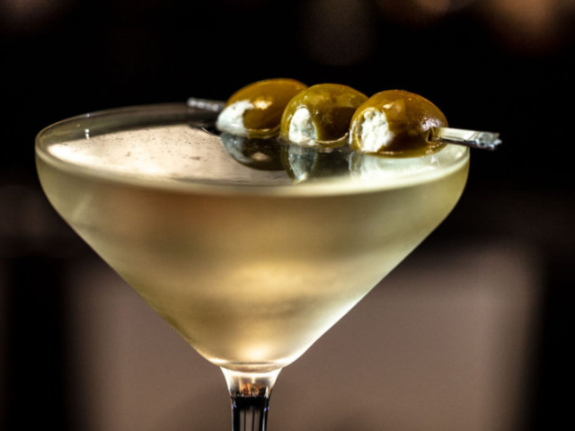 Dirty martini with three blue-cheese stuffed olives