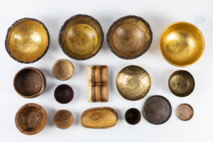 Gold, brass and wood bowls