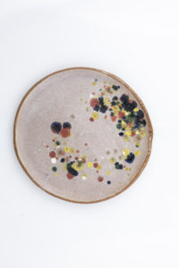 Handmade speckled pottery plate