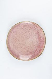 Glossy pink salad plate with gold rim