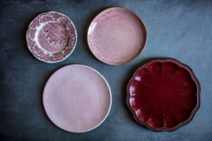 Pink and red plates for food photo shoots