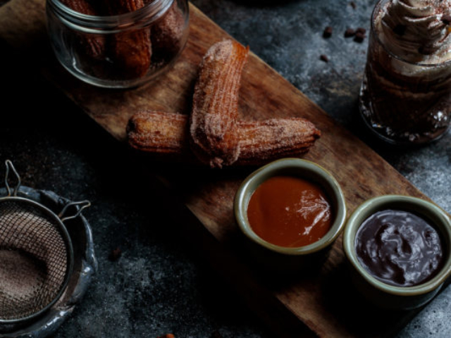Chocolate cinnamon churros with two types of dipping sauce