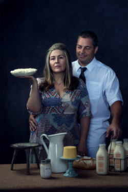 Sexy photo of farmers holding fresh raw  milk